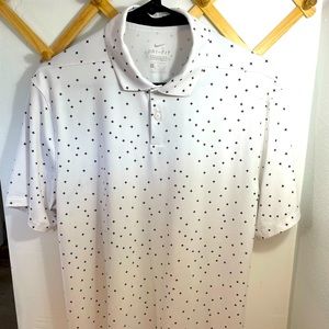 White Nike Dri Fit golf polo with details. Size medium. Nike logo on sleeve.